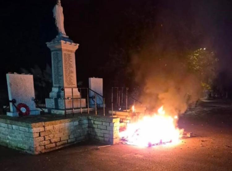 Police are appealing for information to help find those responsible for an arson at Marple Cenotaph (Image - GMP)
