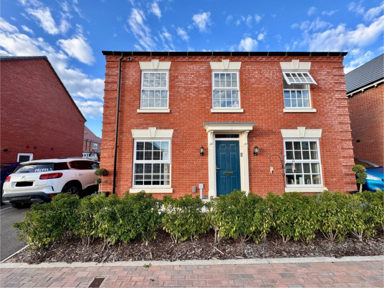 Impressive modern façade of this stylish Davidsons-built family home on Lowe Street, Hugglescote.