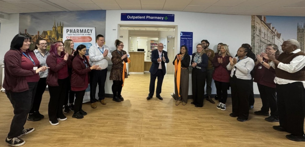 Photo caption: John Rostill, SWFT Clinical Services Chair, opening the facility alongside SWFT Clinical Services Pharmacy staff members (image via South Warwickshire University NHS Foundation Trust) 