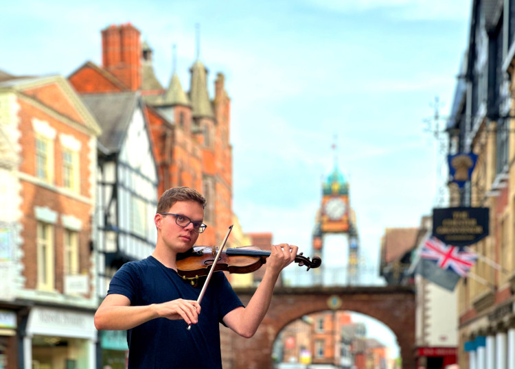 Philip Chidell can usually be found entertaining residents and tourists alike in the shadow of Chester's iconic Eastgate clock (Image supplied)