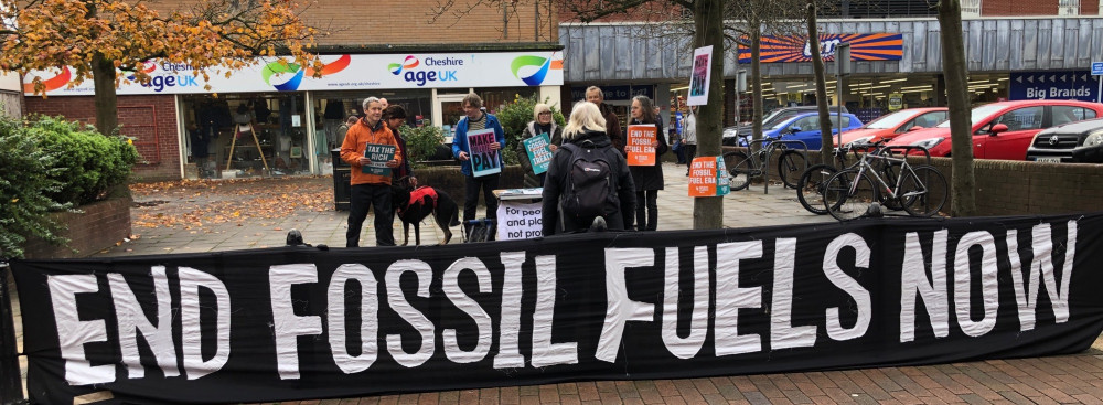 Global Justice Macclesfield were in town on Saturday, November 8, talking to the public about climate change and transitioning away from fossil fuels (Credit: GJM)