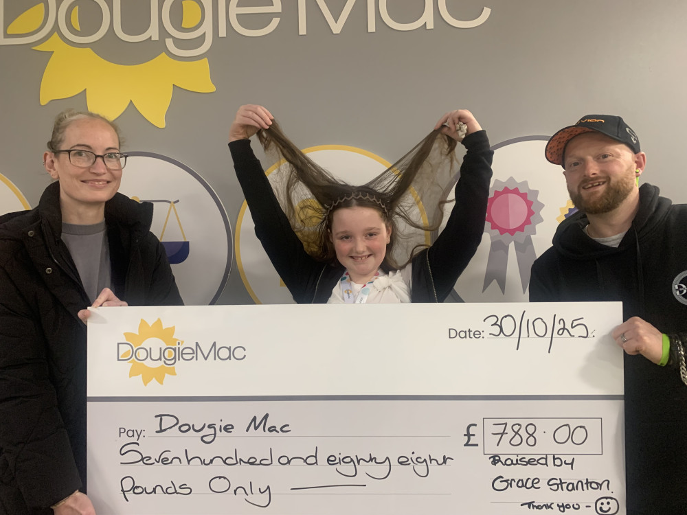 Grace Stanton decided to cut her hair after the death of her great-grandad who received care from the Dougie Mac team (image via Dougie Mac)