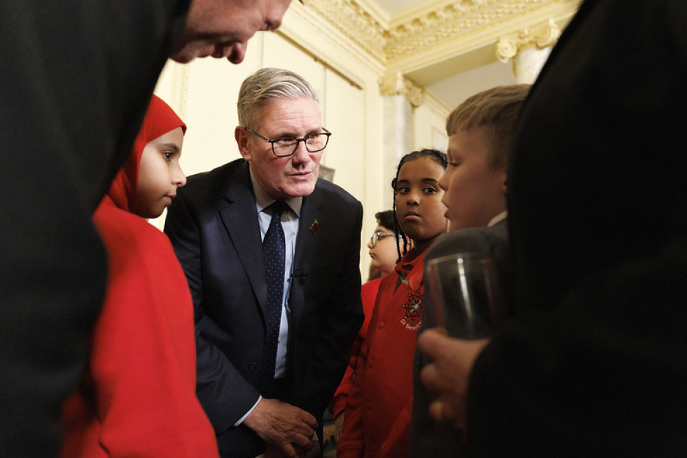 Jayden (right) talking to PM Keir Starmer (image via national Frances Tidey)