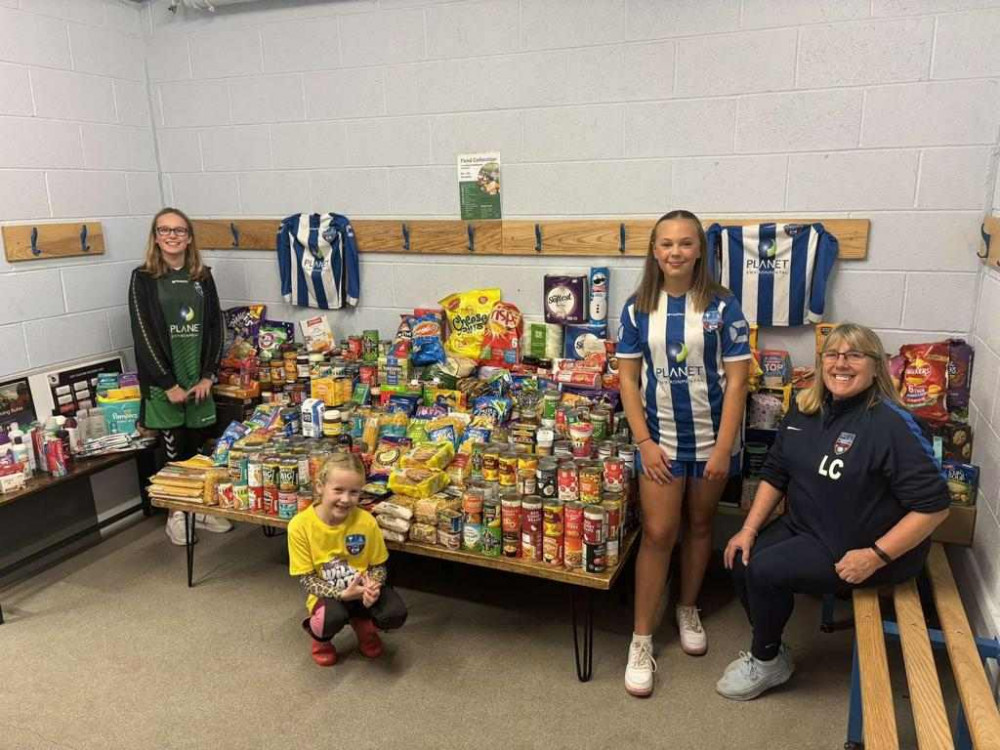 Liz Clark (far right) wit donations for a previous appeal. (Photo: Liz Clark)