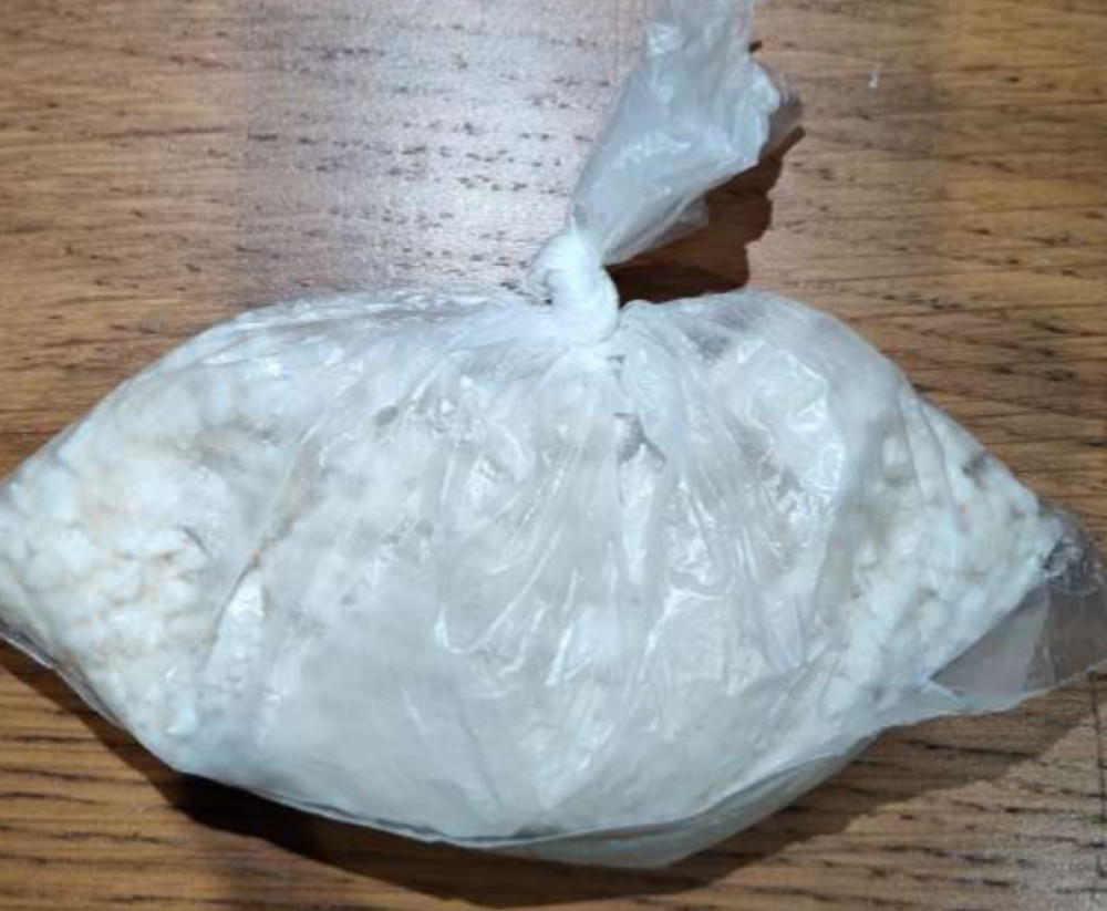 Police seized cash, drugs and a weapon following a pursuit from Brinnington, through Stockport town centre and then to Offerton (Image - GMP)