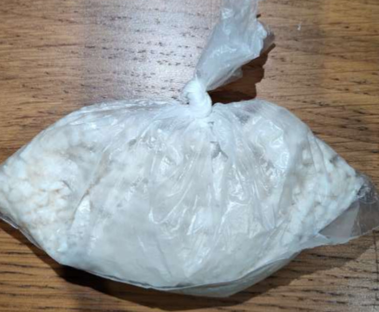 Police seized cash, drugs and a weapon following a pursuit from Brinnington, through Stockport town centre and then to Offerton (Image - GMP)