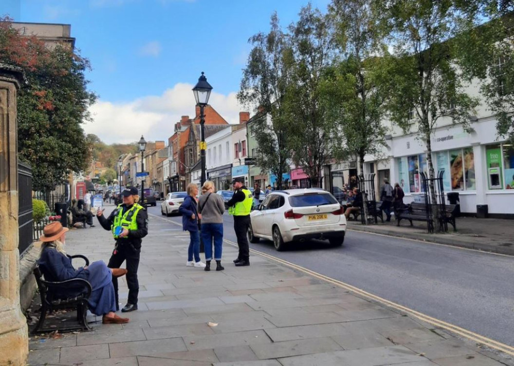 Police in Glastonbury High Street