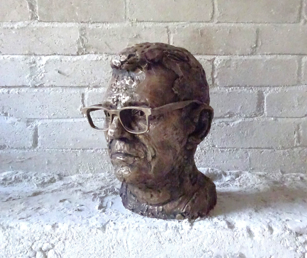 Andy Burnham was briefly lost for words as he was shown an 18kg bronze sculpture of his head (Image - Anthony Pladgett)