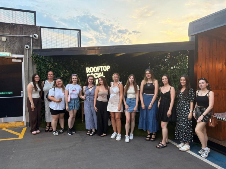 Emily O'Connor, fifth from the left, is the face behind the Girls Collective (Image supplied)