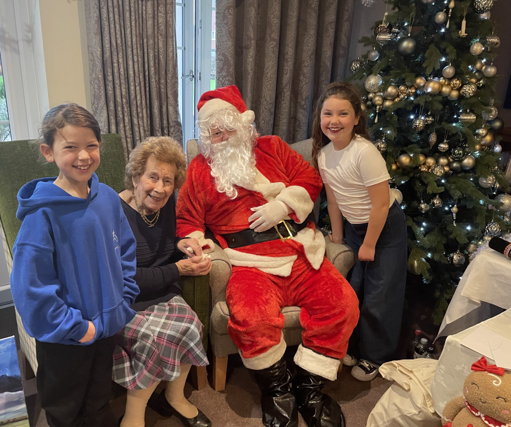 Santa visited Crandon Springs Care home and enjoyed meeting residents and their families, including Rose and her great-grandchildren.