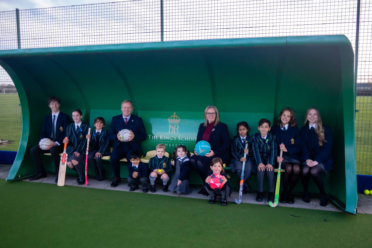 Headmaster George Hartley pictured here with Michelle Dewhurst, Head of Willow  Lodge and Junior School, and pupils from across the school (Image supplied)