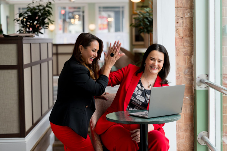 Bianca and Amanda celebrate marketing success (image via Dave Perry Photography)