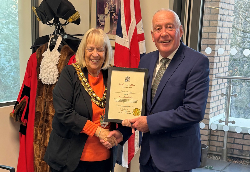 Mayor Cllr Sue Shinnick presents Martin with his certificate of recognition.