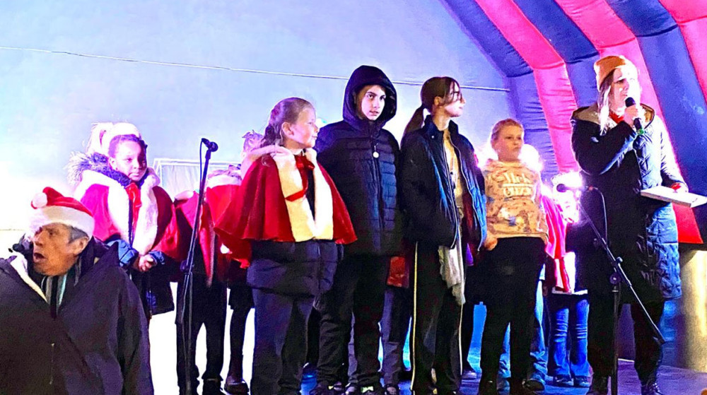 MP Jen Craft, assisted by Tony, Nikki, Amanda and Margaret switched on the lights.