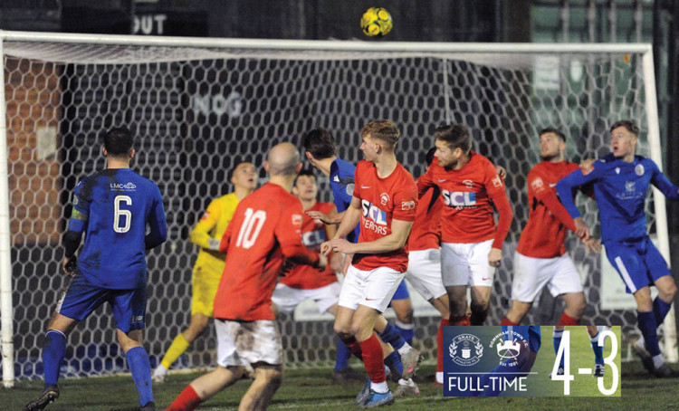 Alex Moss's flicked header proved to be a late winner. Picture by Laurie Rampling