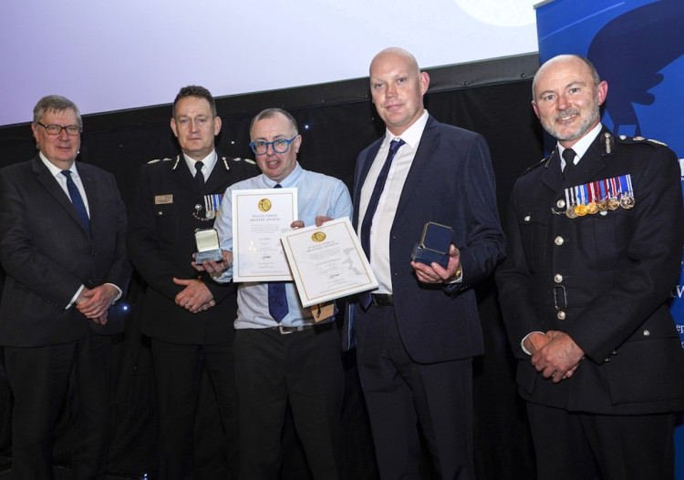 Lee Butler and Tony McNamara helped a family escape a burning building.