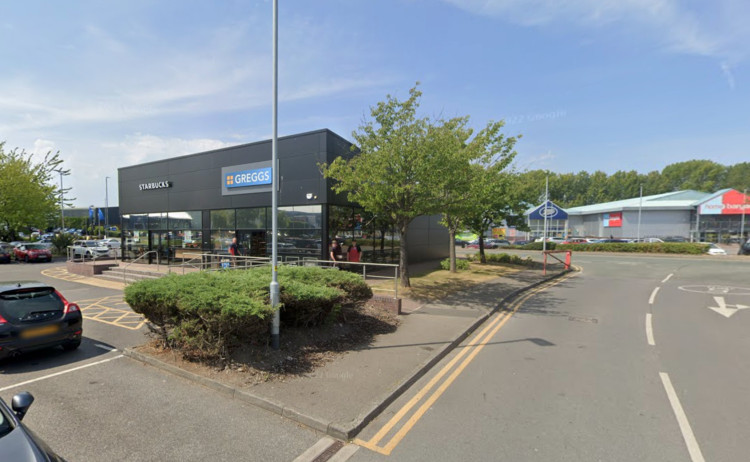 A car collided with a pedestrian outside Greggs at the Greyhound Retail Park (Image via: Google)