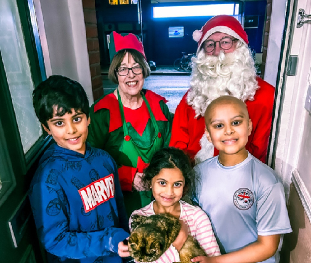 More than 100 children across London, Surrey and Sussex received a visit from Santa and his elves at the weekend (Credit: Momentum)