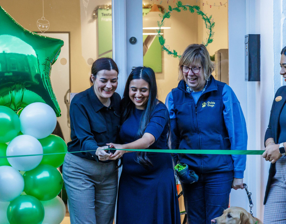 Priyanka Aggarwal and Kimberley Bewick cutting the ribbon