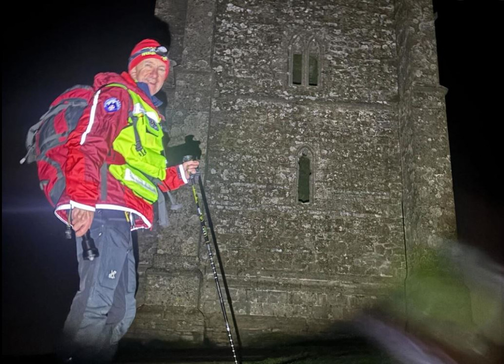 Search teams on Glastonbury Tor during the early-hours operation on Thursday, 11 December