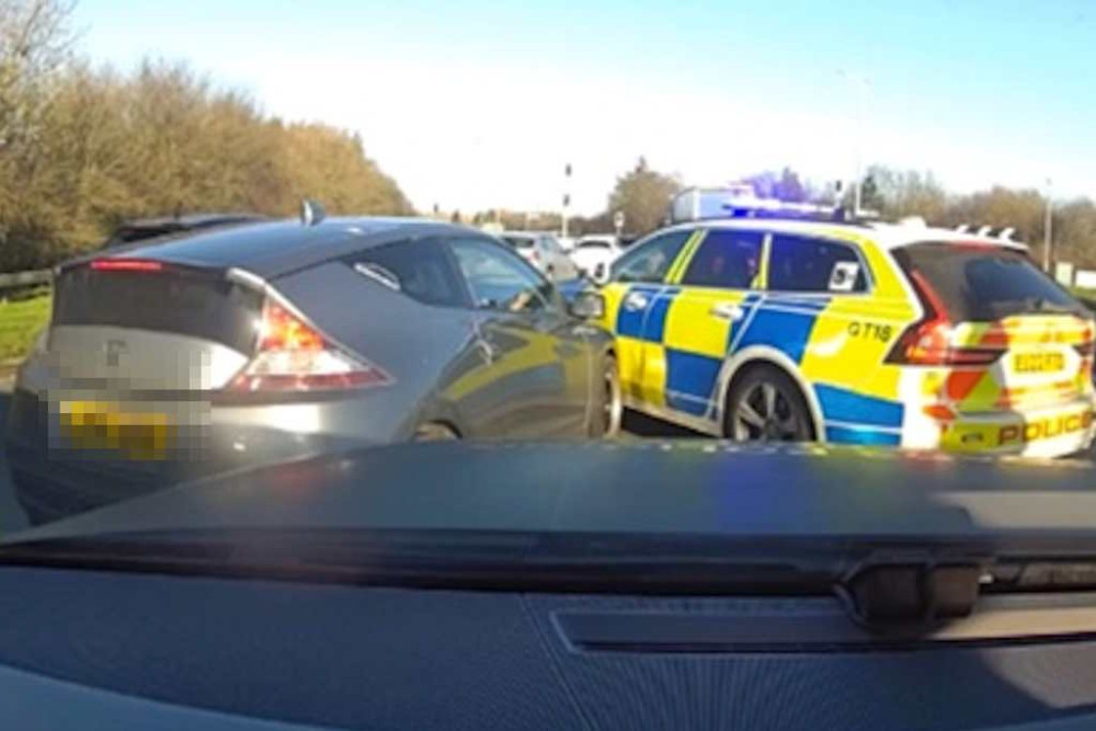 Car was brought to a halt by police. 