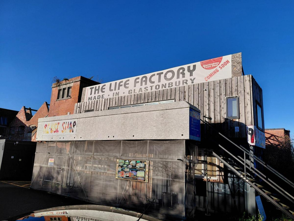 Glastonbury's £3m Life Factory project collapses amid funding issues; builders bankrupt, £2.3m untracked, police probe ongoing.