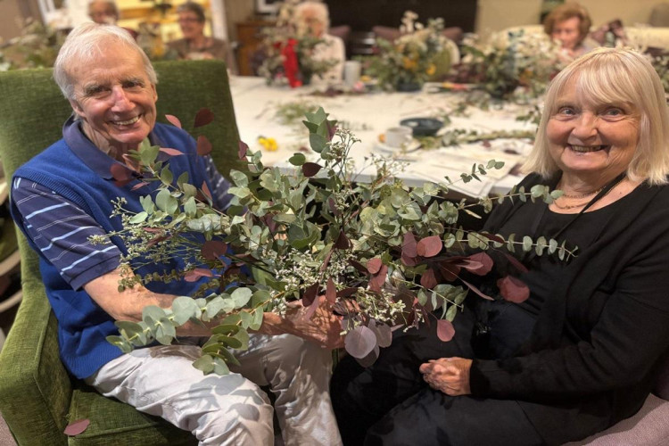 Residents at Crandon Springs Care Home in Wells embraced the Christmas spirit with cake baking and floral workshops. 