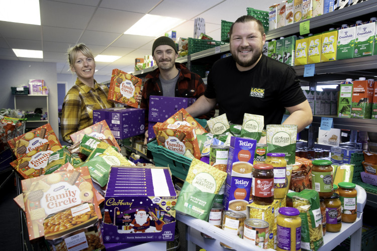 Kate Junory-Lusar and Jez Chalmers from St Paul's Centre food bank with Richard Warner from Lock Stock Self Storage (Photo: Supplied).