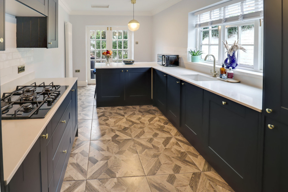 The newly fitted kitchen is well equipped with integrated appliances