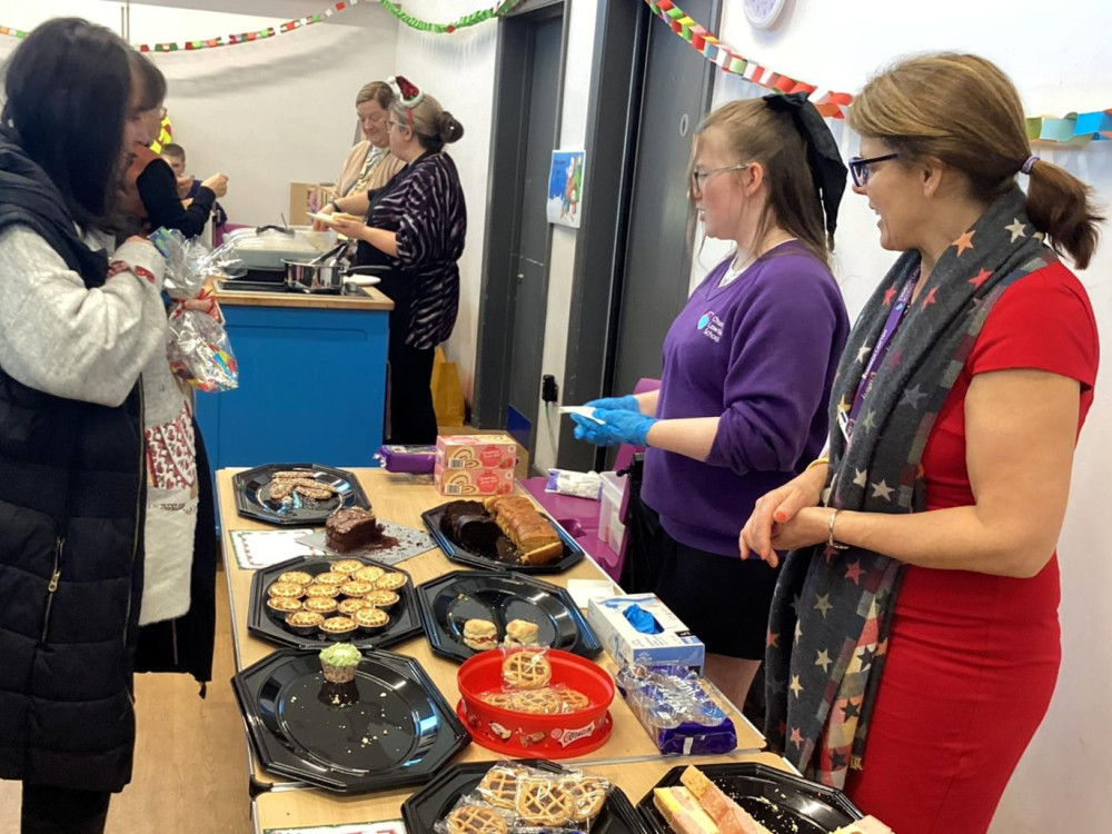 There was a wide range of stalls and activities including a festive photo-booth (image via Church Lawton School and Denford Associates)