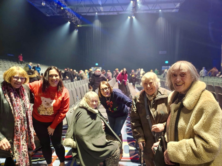 Six clients and their carers had their wishes granted with a festive trip to the pantomime (Photo: Right at Home East Staffs)