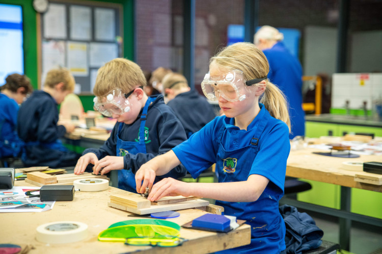 Year 5 students at Kew House School using its Design & Technology Workshop (credit: Image supplied).