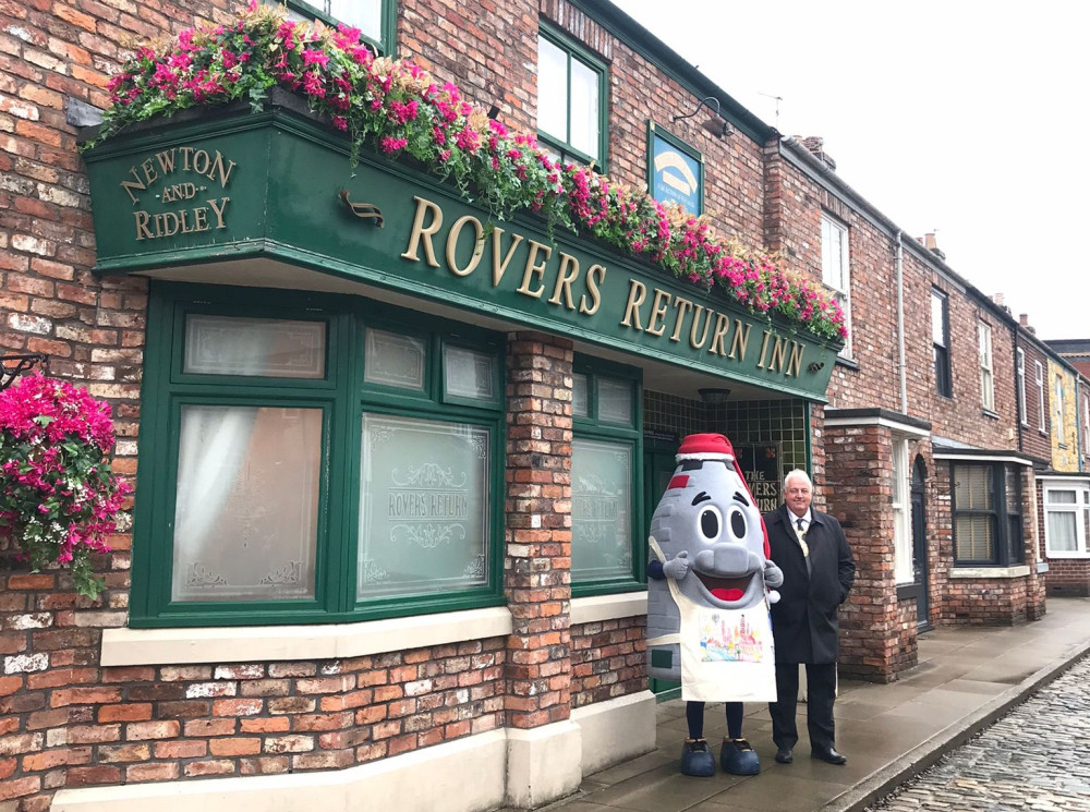 Kelvin the Kiln and the Lord Mayor of Stoke-on-Trent visited some of Salford's landmarks including the Coronation Street cobbles (image via Stoke-on-Trent City Council)