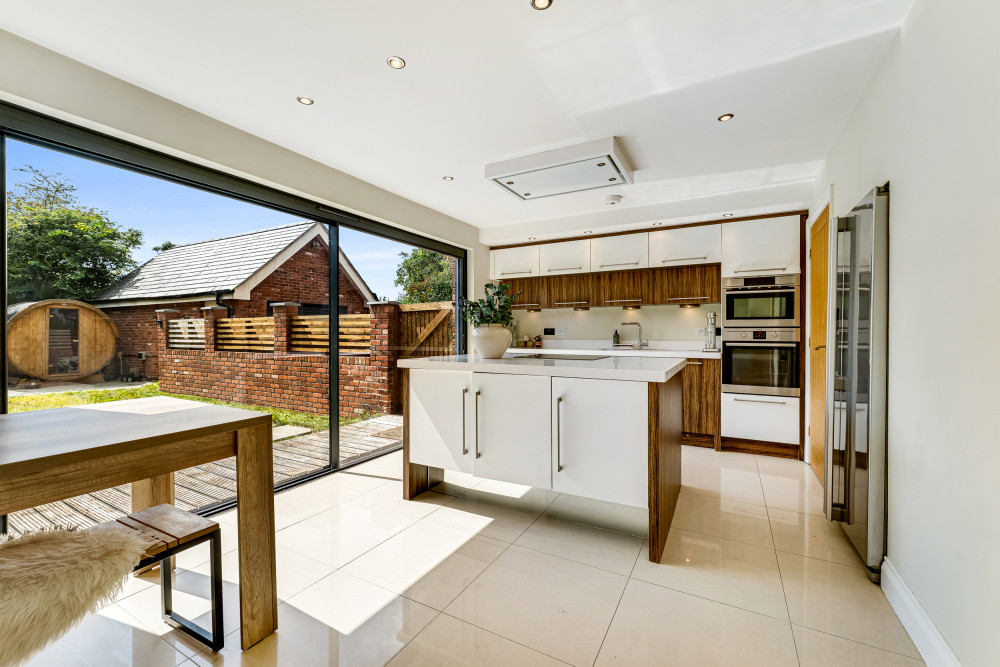 The impressive open-plan kitchen and dining area forms the heart of the home (Thornley Groves)