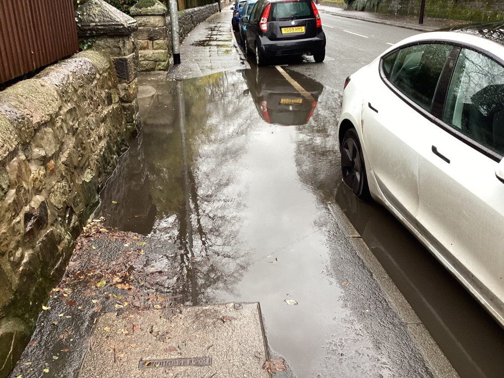 A section of The Avenue in Kidsgrove puddles with water meaning pedestrians regularly have to walk in the road (image via David Barber)