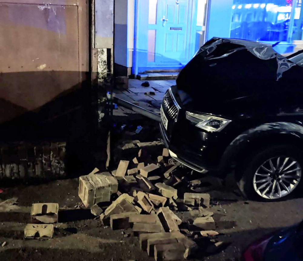 A wall was demolished in the incident. 