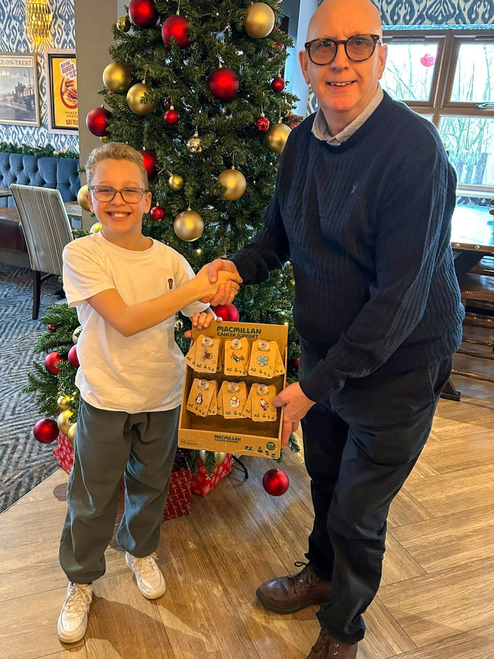 Wistaston Church Lane Academy pupil, Wilson Laurie, 11, with area manager at Greene King, Rob Keithley (Photo: Supplied).