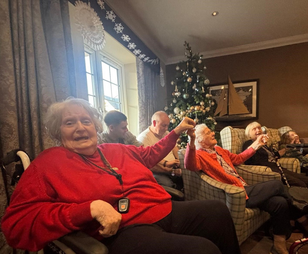 Residents (L-R) Barbara, Joy, Christine and Greta, joined the Christmas sing along at Crandon Springs Care Home.  