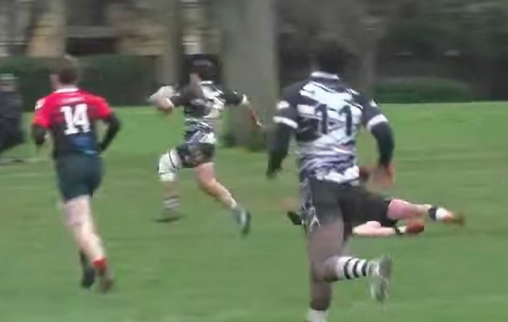 Kodie Holloway races away to score. 