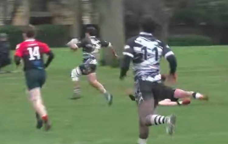 Kodie Holloway races away to score. 