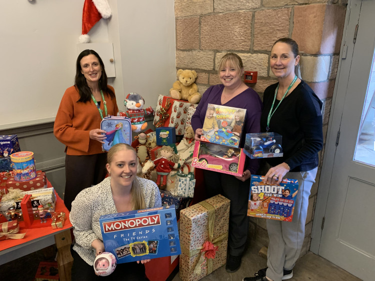 Staff from Congleton Town Council with donated presents. Debbie Coxon, Celeste Smith, Rachel McCarthy and Jess Thyer (Credit: CTC)