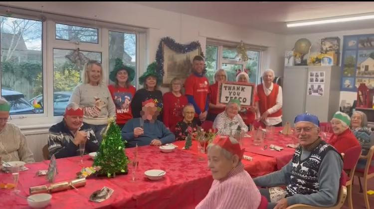 Tesco Wells Superstore donated 105 Christmas meals to the Lawrence Centre, supporting older people with festivities, crafts, and a raffle.