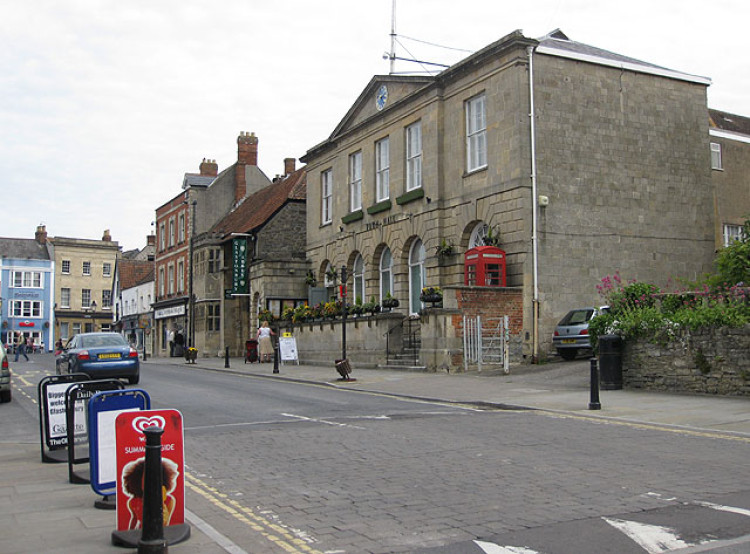 Glastonbury Town Council remains silent on Councillor Lillith Osborn's suspension linked to a white supremacist dating site.