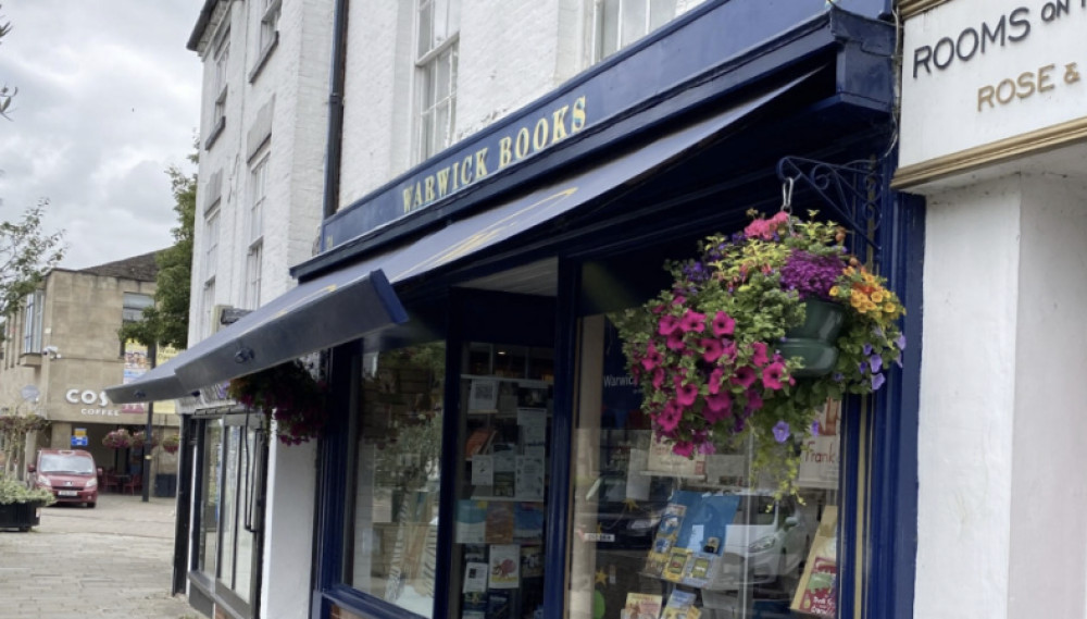 Warwick Books owners seek support against council’s EV parking plan, fearing it could harm local businesses by converting 11 spaces into EV-only bays (image via Nub News) 