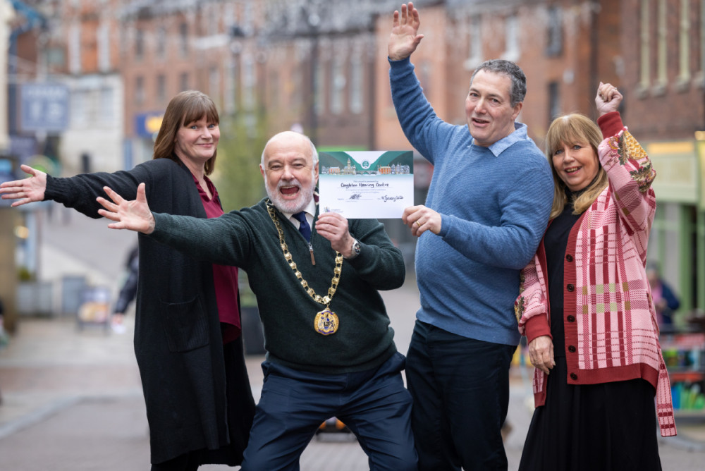 Congleton Hearing Clinic celebrates with the mayor upon receiving an award for their long-standing services to the town (Credit: The Hearing Clinic)