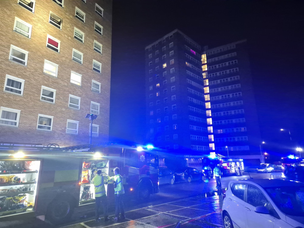 Crews on the scene this evening. The affected flat was on the fifth floor of George Tilbury House (top left in the picture). 