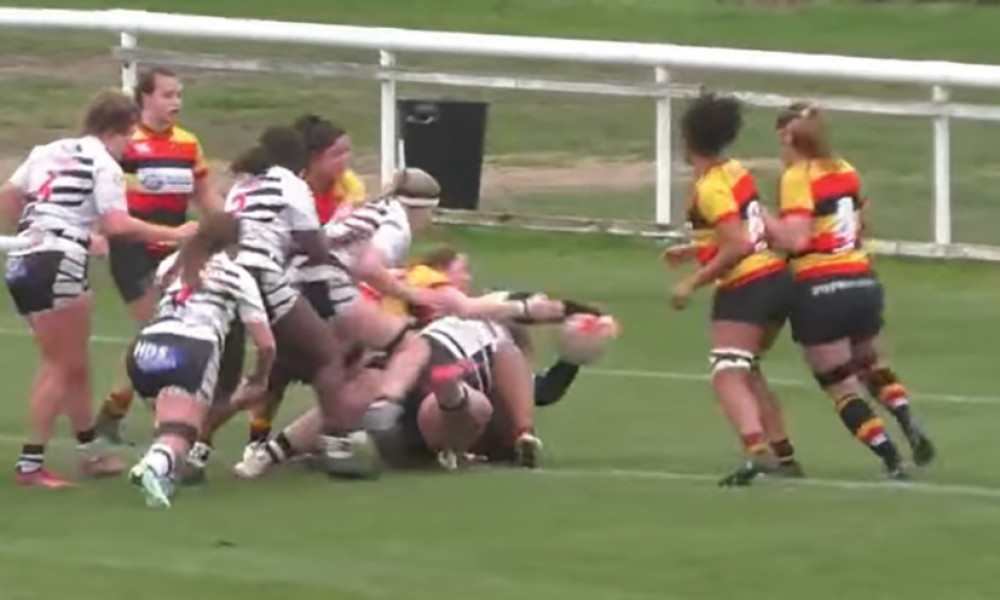 Rosie Bennett drives over for T-Birds' first half try. 
