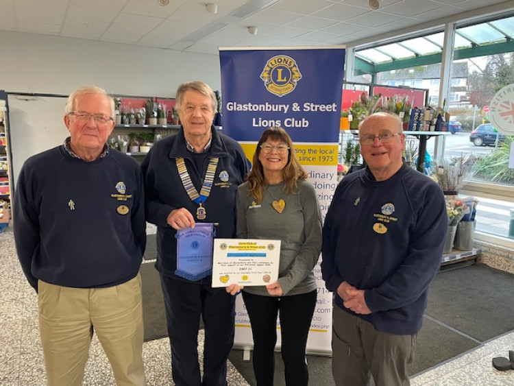 From left to right Lion Peter Hopwood, Lion President Peter Cole, Community Champion at Morrisons, Stella, and Lion John Mulliner (Supplied) 