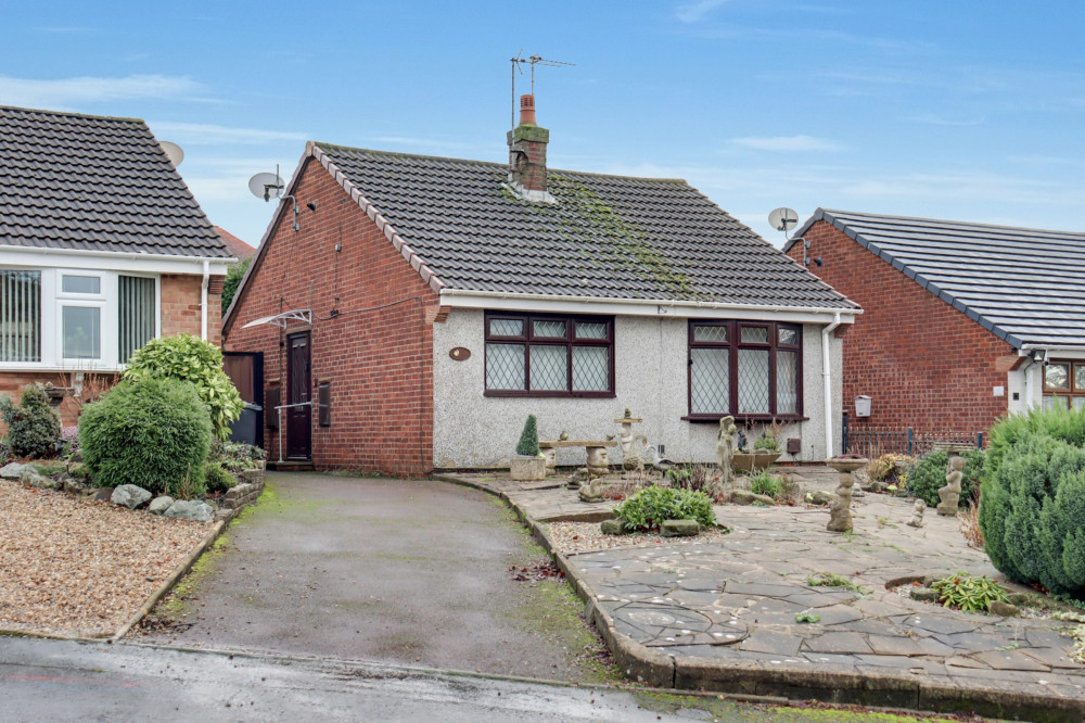 A charming two-bedroom detached bungalow on a quiet Swadlincote cul-de-sac with private garden, driveway and easy amenities