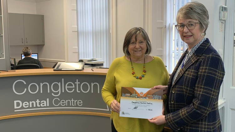 Congleton Dental Centre's Jenny Furnival recieves the award from deputy town mayor, councillor Suzy Firkin (Credit: CTC)